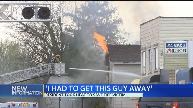 Resident took heat to save fire victim