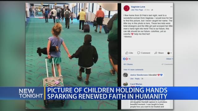Picture of children holding hands sparking renewed faith in humanity